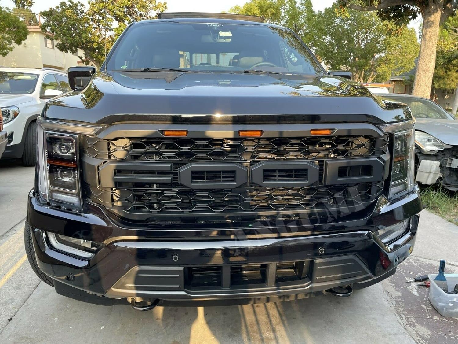 Matte Black Front Grille with Letters & LEDs F93346